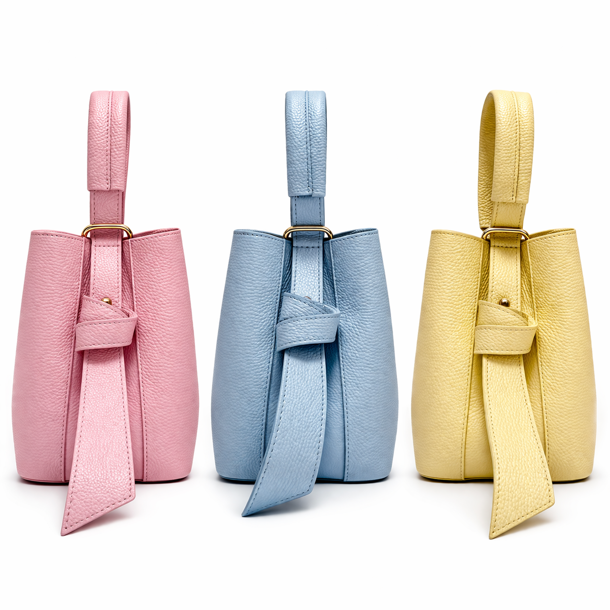 Set borsa secchiello + pochette in vera pelle martellata, pratico ed elegante per ogni occasione.